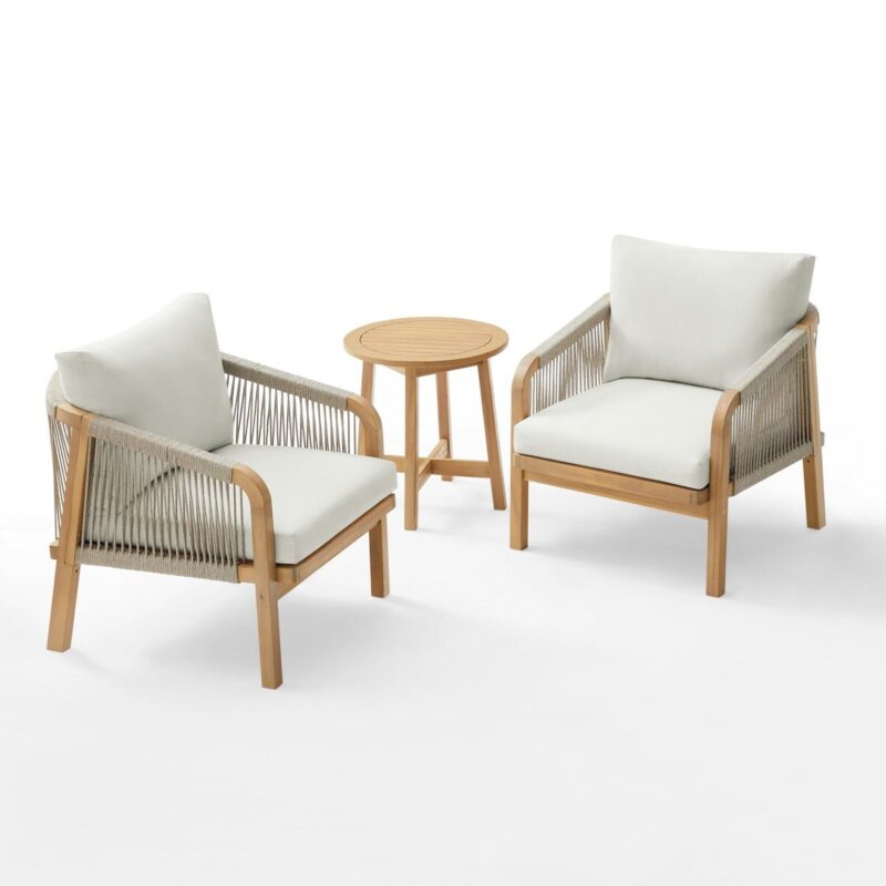 Two chairs and a small table on white background