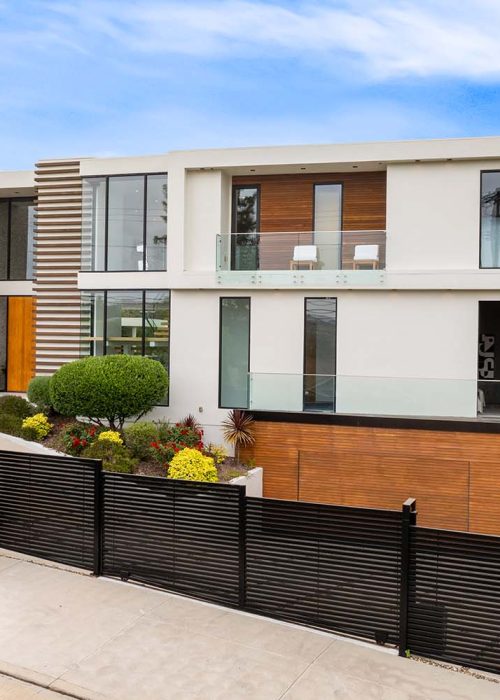 contemporary-house-on-a-corner-lot-with-lush-folia-JMLTCWM.jpg